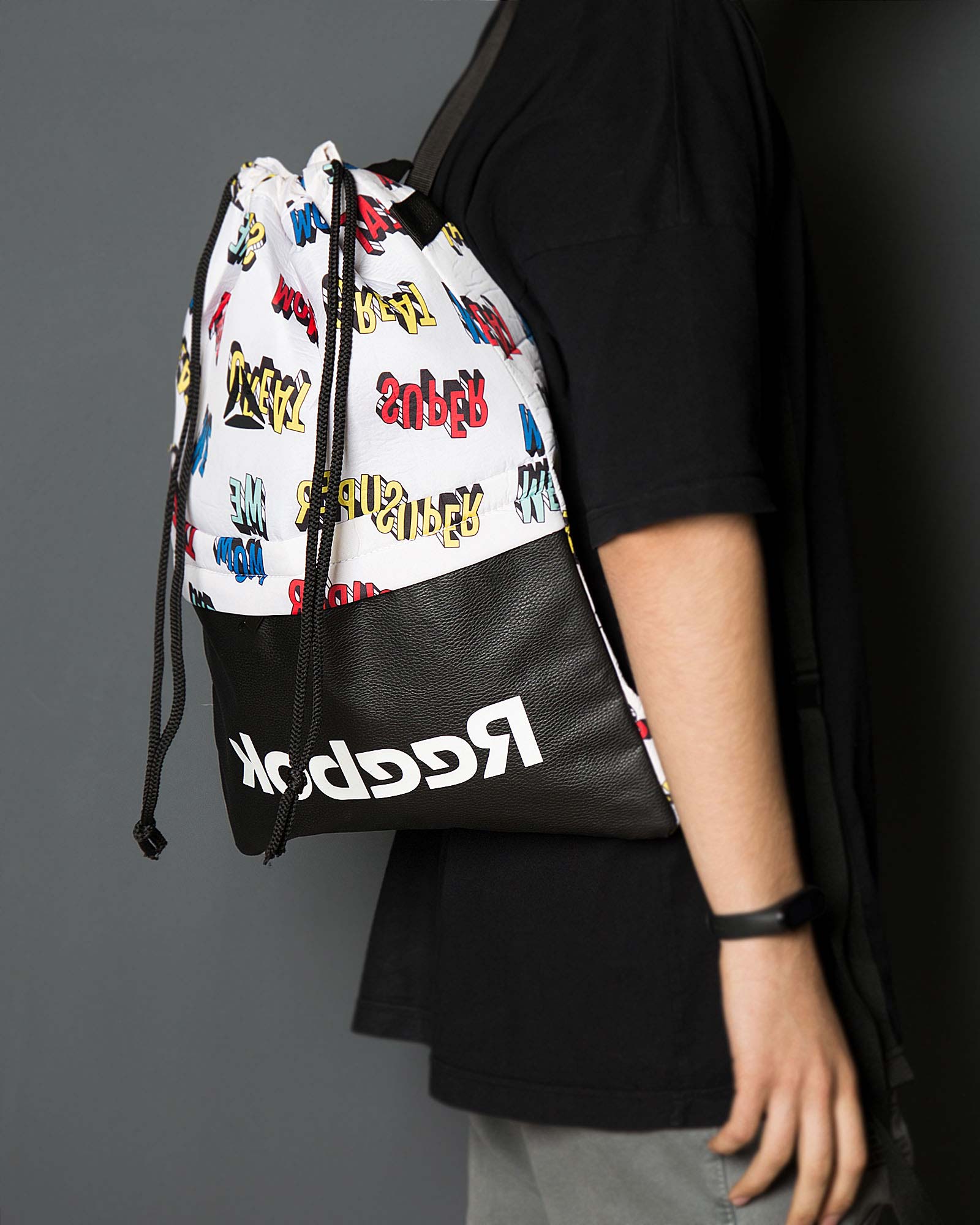 کوله ورزشی طرح نوشته ریباک - سفید - محیطی