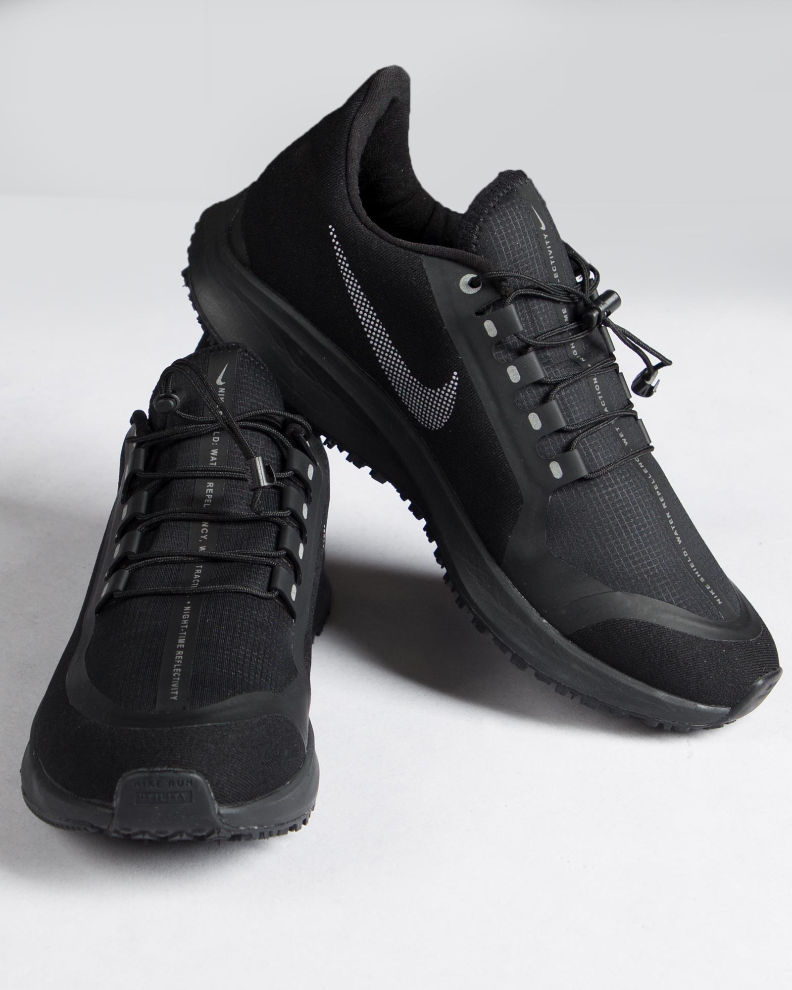 کفش-اسپرت-طرح-نایک-مشکی-روبه-رو-بغل